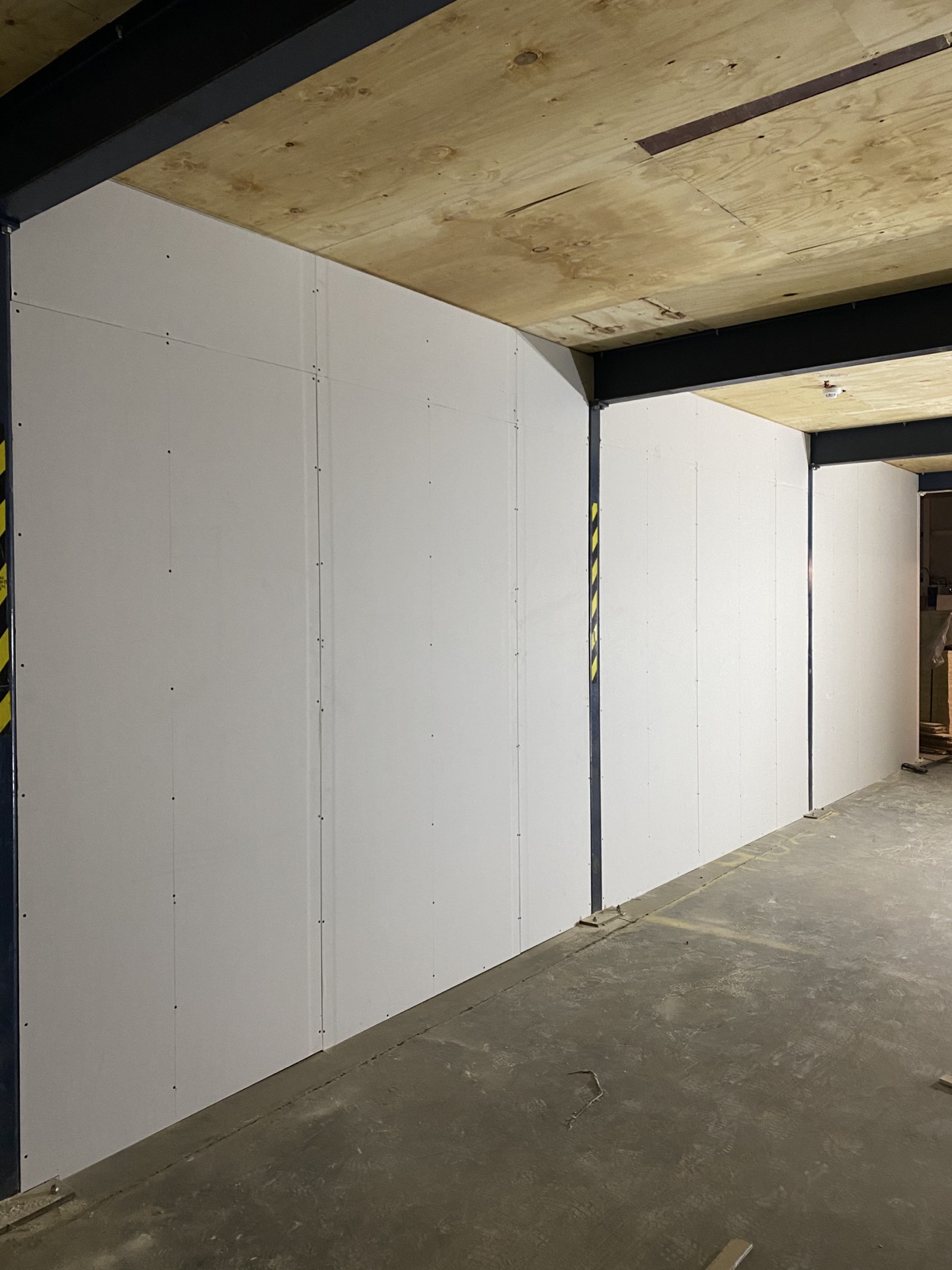 Plasterboard fixed to the new research lab partition walls