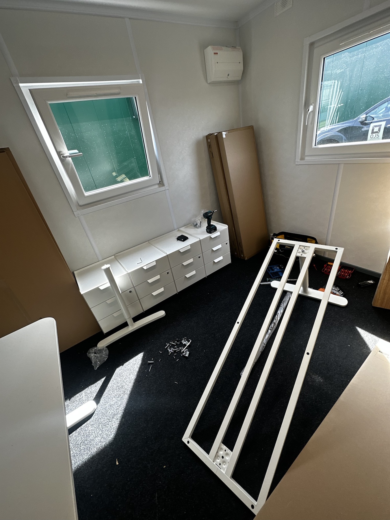 Bedroom furniture being assembled inside an accommodation unit