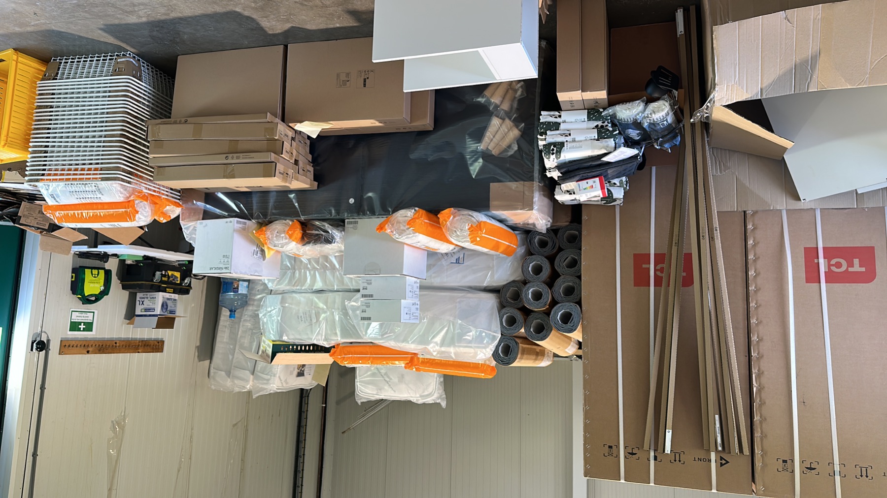 Furniture, mattresses and equipment ready for the Ely accommodation fit-out