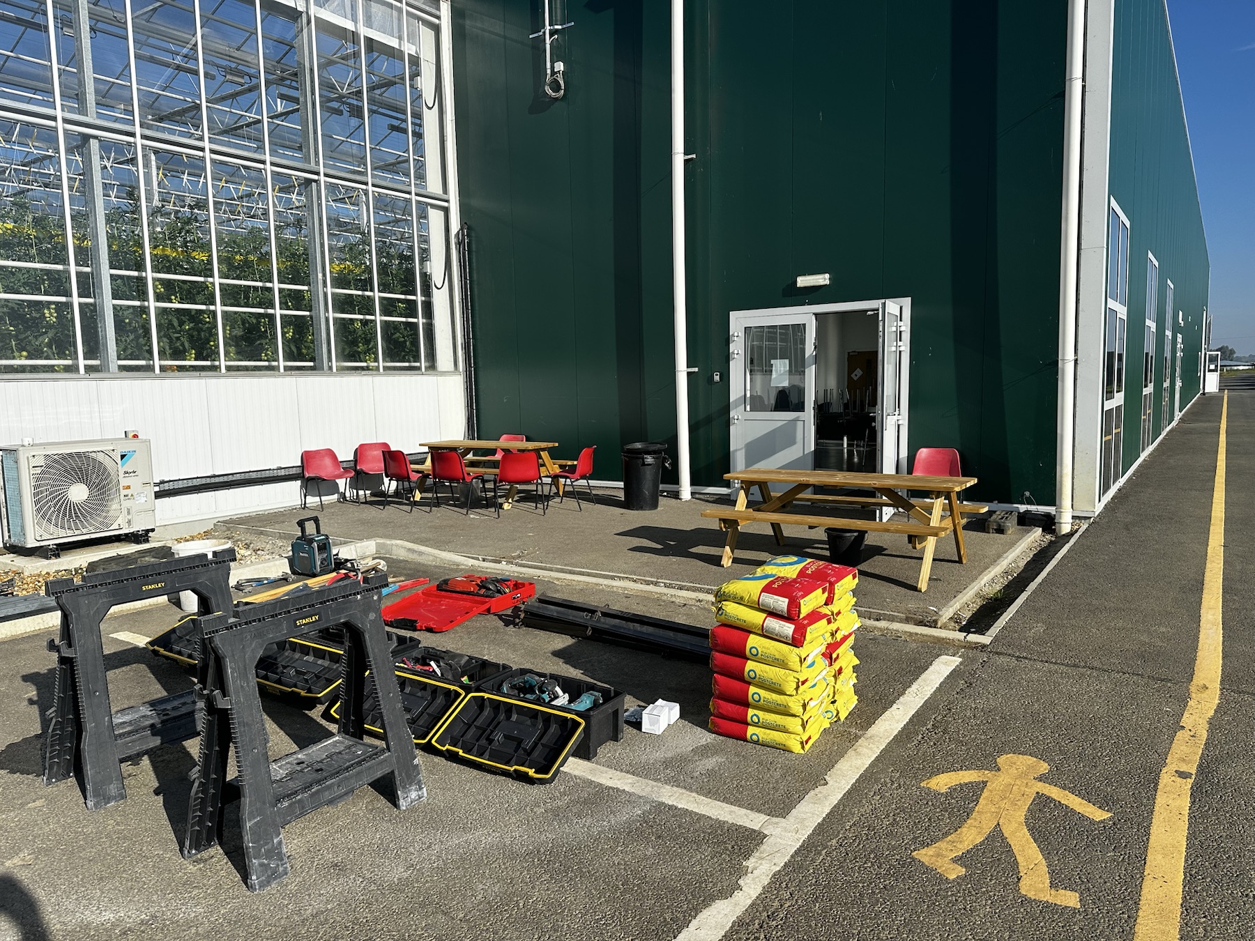 Commercial site in Ely before smoking-area fencing installation