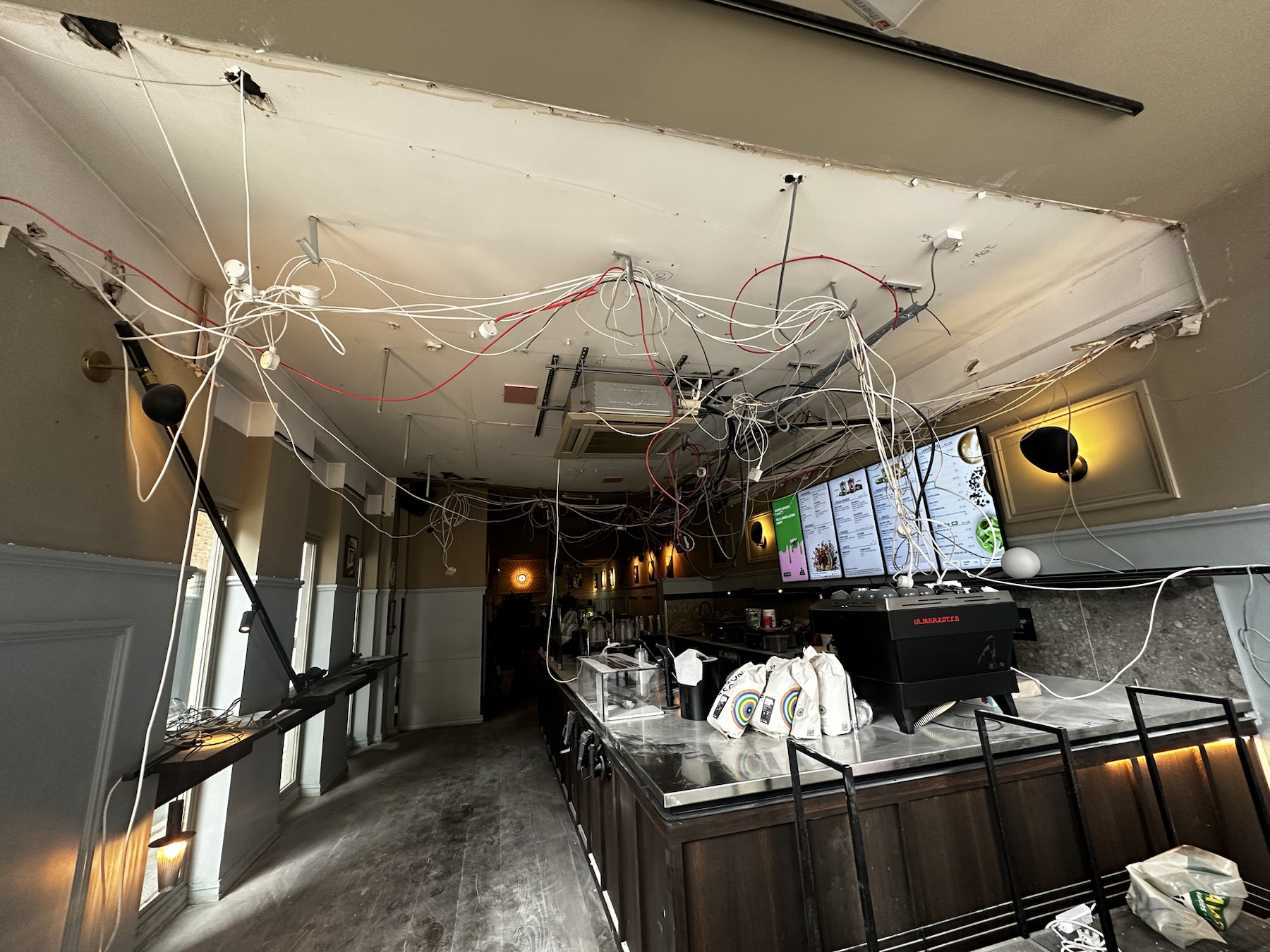 Failed commercial bulkhead ceiling opened for urgent assessment in Kensington