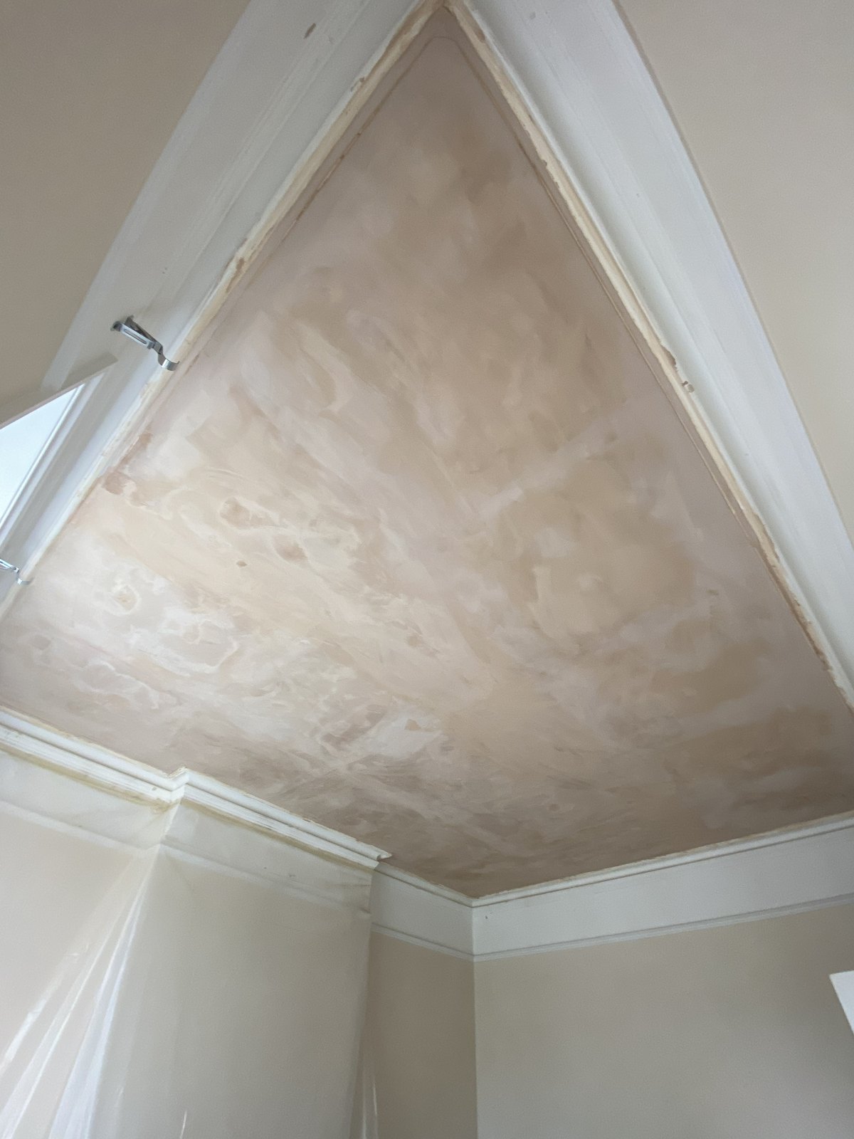 Newly plastered room ceiling in the Maida Vale flat