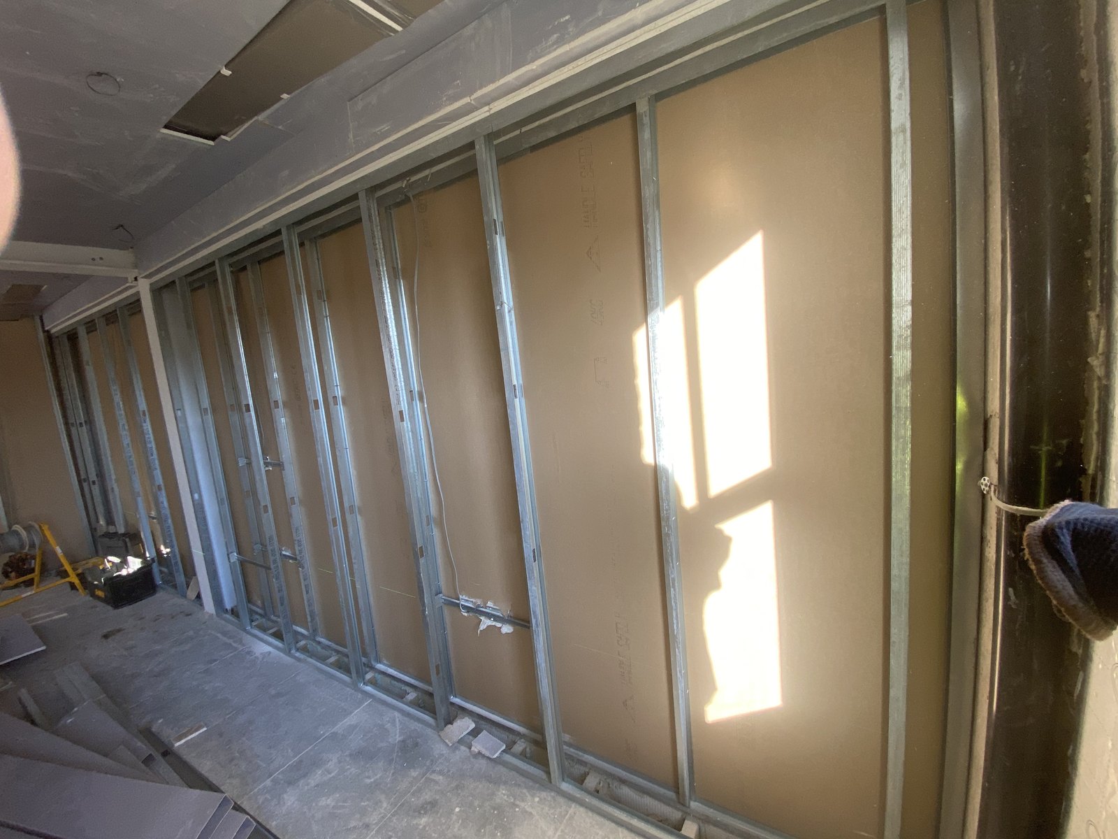 Metal partition wall framing inside the flats project