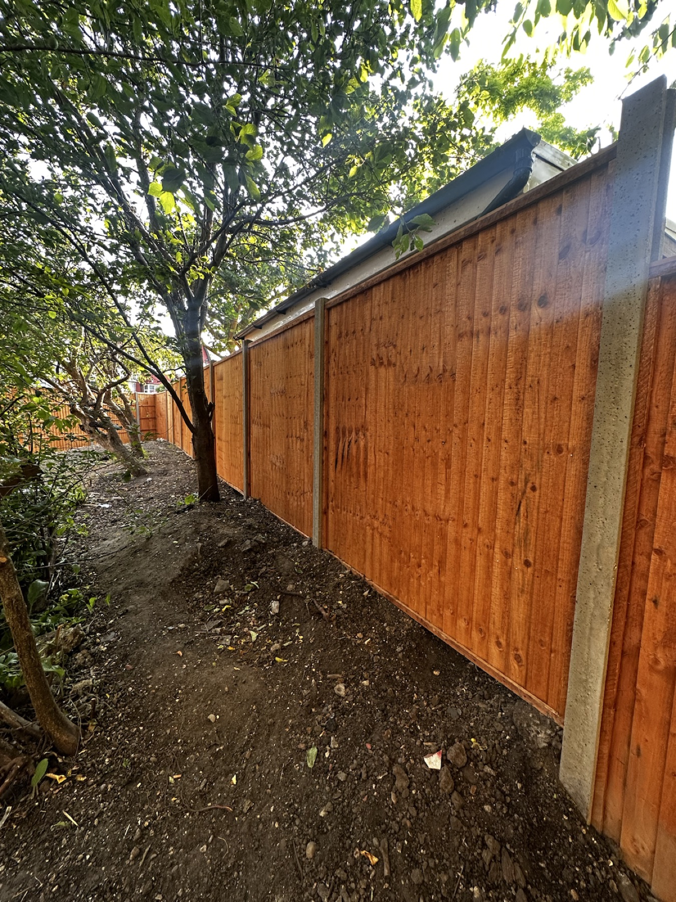 New perimeter fence aligned around retained trees