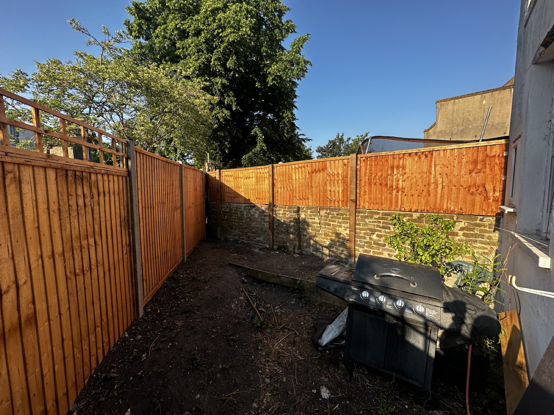 Finished rear boundary fencing around the Streatham garden