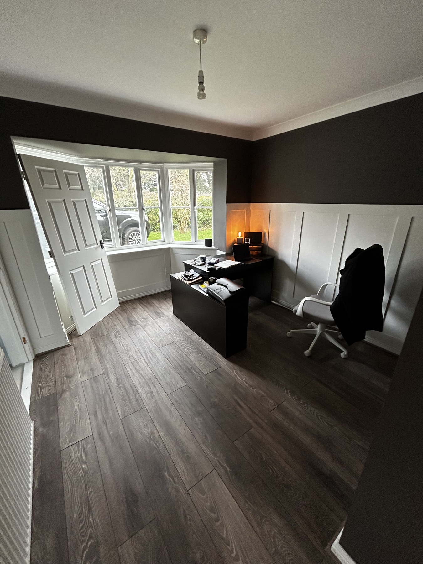 Completed home office with new flooring and wall panelling