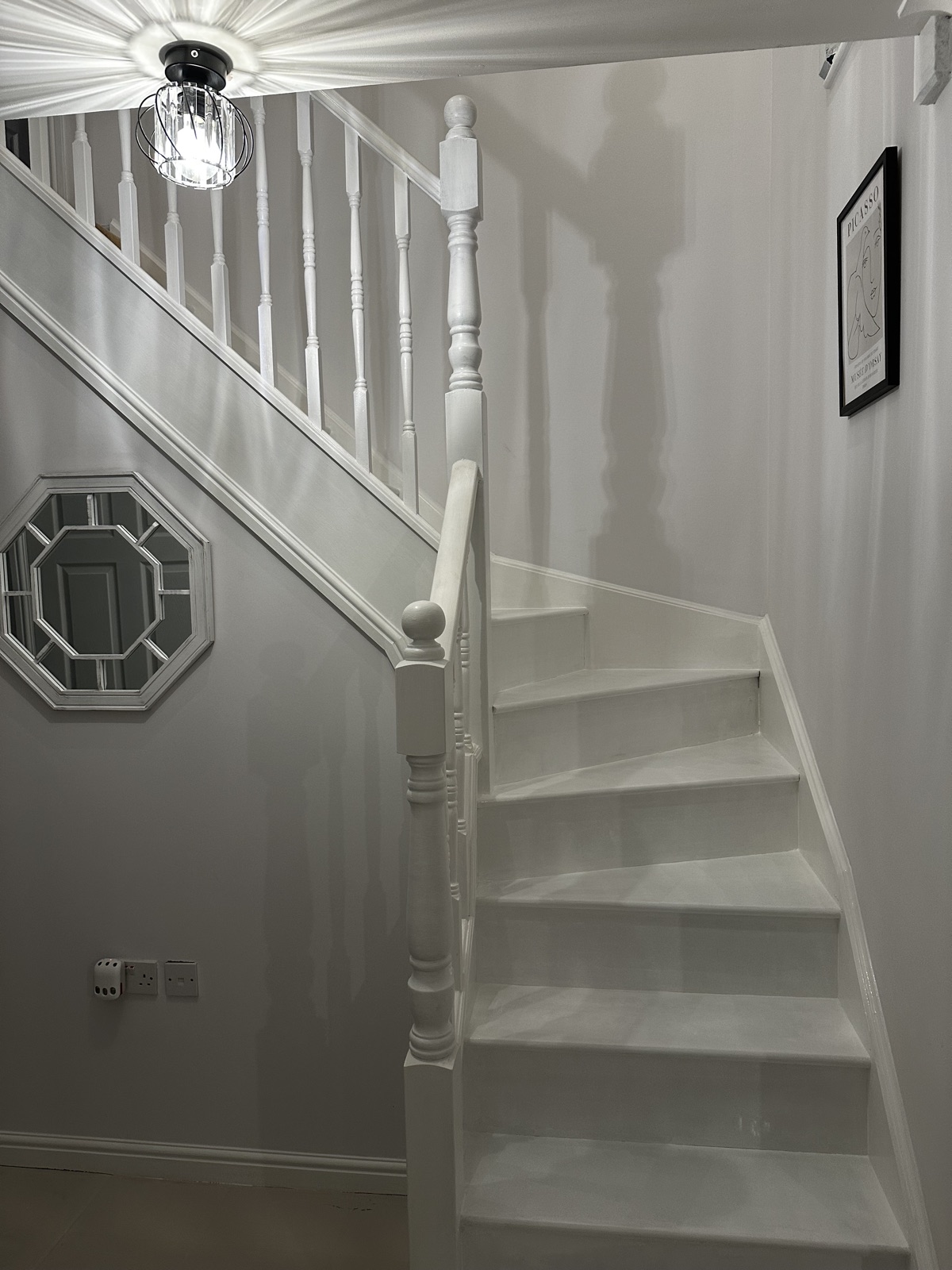 Completed white painted staircase after refurbishment